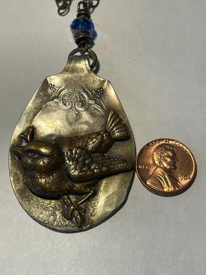 Vintage Hand Made Hammered Spoon Bird Pendant on a 34" Chain in VG Preowned Condition. FREE DOMESTIC SHIPPING