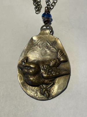 Vintage Hand Made Hammered Spoon Bird Pendant on a 34" Chain in VG Preowned Condition. FREE DOMESTIC SHIPPING