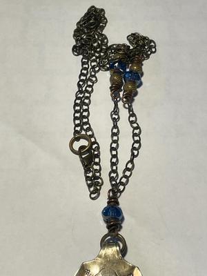 Vintage Hand Made Hammered Spoon Bird Pendant on a 34" Chain in VG Preowned Condition. FREE DOMESTIC SHIPPING
