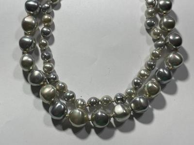Vintage Preowned Mid-Century Freshwater Double Strand Choker Necklace Inner Length 14" with a Sterling Silver Clasp as Pictured.