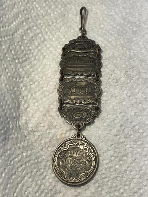 ANTIQUE 1607/1907 JAMESTOWN TER-CENTENNIAL EXPOSITION SILVER WATCH FOB IN GOOD PREOWNED CONDITION. FREE DOMESTIC SHIPPING.
