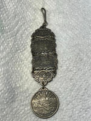 ANTIQUE 1607/1907 JAMESTOWN TER-CENTENNIAL EXPOSITION SILVER WATCH FOB IN GOOD PREOWNED CONDITION. FREE DOMESTIC SHIPPING.