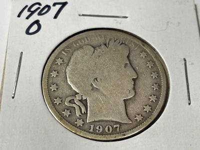1907-O CIRCULATED CONDITION BARBER SILVER HALF DOLLAR AS PICTURED.