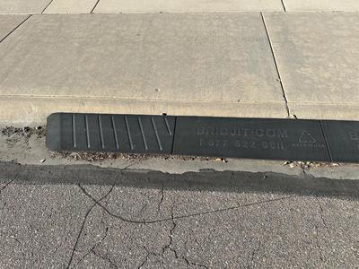 SIDEWALK GUTTER RUBBER RAMP