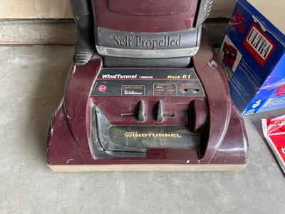 ULTRA DIRT DEVIL AND A HOOVER WINDTUNNEL VACUUMS