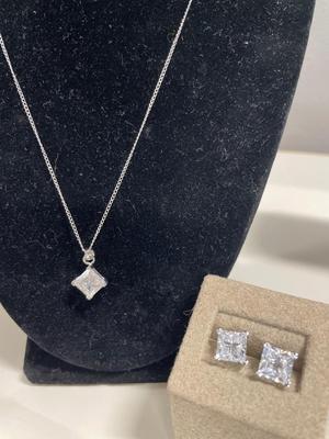 Sterling necklace with sparkling pendant and matching earrings