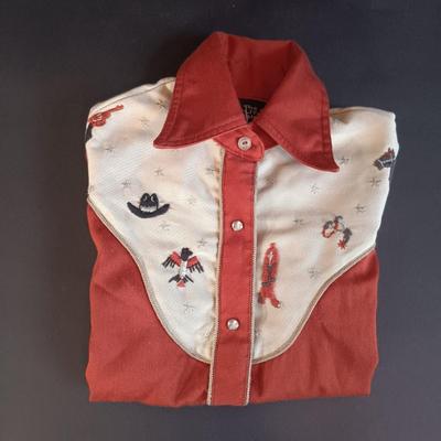 LOT 7: Vintage Elite Clothing Co. Cowboy Shirt, Western Stampin' Barbie and Ken, Lone Ranger Cheerios Tin & More