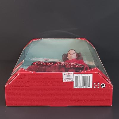 LOT 10: Coca Cola Majorette and Fountain Girl Barbies, Marilyn Monroe 'The Seven Year Itch' Doll & More