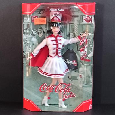 LOT 10: Coca Cola Majorette and Fountain Girl Barbies, Marilyn Monroe 'The Seven Year Itch' Doll & More