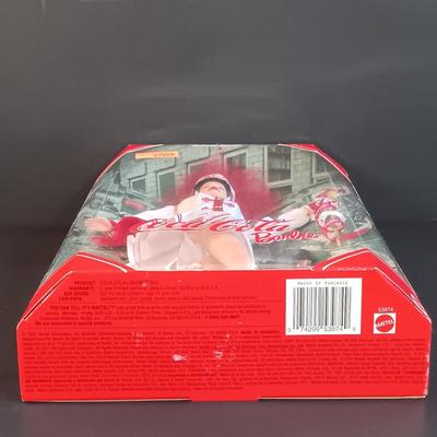 LOT 10: Coca Cola Majorette and Fountain Girl Barbies, Marilyn Monroe 'The Seven Year Itch' Doll & More