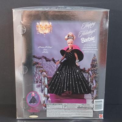 LOT 10: Coca Cola Majorette and Fountain Girl Barbies, Marilyn Monroe 'The Seven Year Itch' Doll & More
