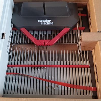 LOT 13: Bond Incredible Sweater Machine NIB w/ Crocheted Blanket