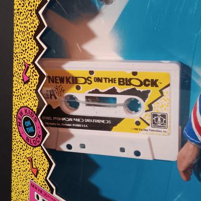 LOT 44: New Kids on the Block In Concert 1990 Donnie Doll NIB with All 4 Band Member Dolls on Stands