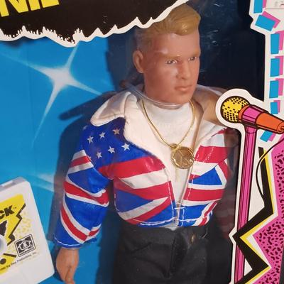 LOT 44: New Kids on the Block In Concert 1990 Donnie Doll NIB with All 4 Band Member Dolls on Stands