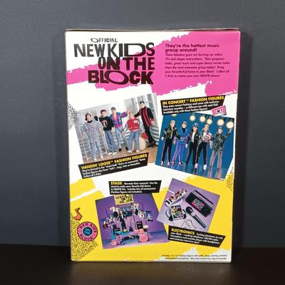 LOT 44: New Kids on the Block In Concert 1990 Donnie Doll NIB with All 4 Band Member Dolls on Stands