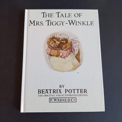 LOT 51: Beatrix Potter Collection Featuring Wedgwood Peter Rabbit Cup and Bowl, Barbie Peter Rabbit Doll, Schmid Tom Kitten Music Box...