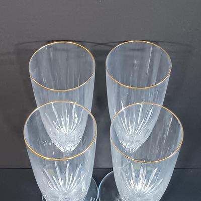 LOT 53: Set of (4) Waterford Marquis Gold Rimmed Champagne Flutes