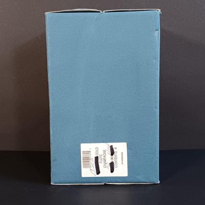 LOT 53: Set of (4) Waterford Marquis Gold Rimmed Champagne Flutes