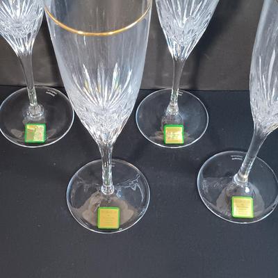 LOT 53: Set of (4) Waterford Marquis Gold Rimmed Champagne Flutes