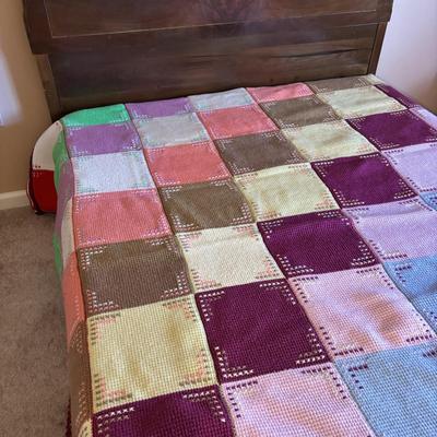 LOT 83: Hand Crocheted/Knitted Block Bed Cover/Blanket