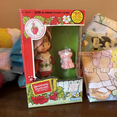 LOT 88: Vintage Strawberry Shortcake Doll, Popples Fuzzy Pillow Cover, Strawberry Shortcake Ornament, Strawberry Shortcake Music Box,...