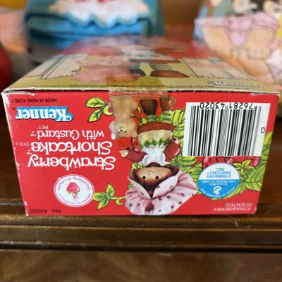 LOT 88: Vintage Strawberry Shortcake Doll, Popples Fuzzy Pillow Cover, Strawberry Shortcake Ornament, Strawberry Shortcake Music Box,...