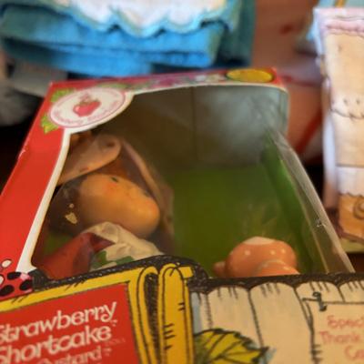 LOT 88: Vintage Strawberry Shortcake Doll, Popples Fuzzy Pillow Cover, Strawberry Shortcake Ornament, Strawberry Shortcake Music Box,...