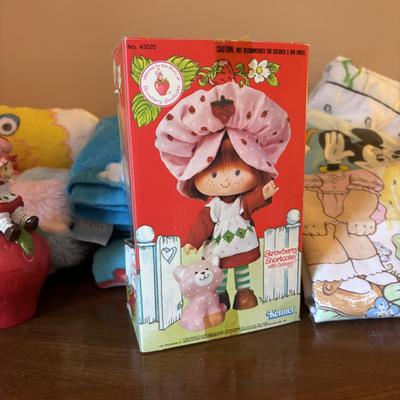 LOT 88: Vintage Strawberry Shortcake Doll, Popples Fuzzy Pillow Cover, Strawberry Shortcake Ornament, Strawberry Shortcake Music Box,...