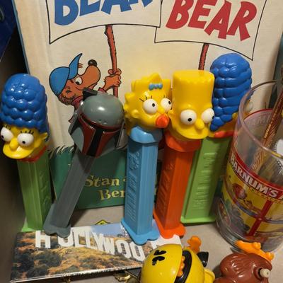 LOT 90: Dr. Suess Books, Wind-up Walking Toys. Simpsons Pez Dispensers, Fisher Price Medical Kit & More