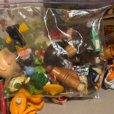 LOT 90: Dr. Suess Books, Wind-up Walking Toys. Simpsons Pez Dispensers, Fisher Price Medical Kit & More