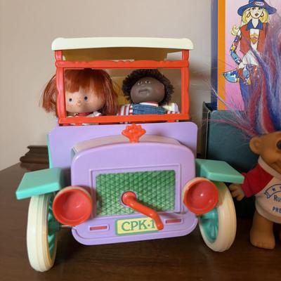 LOT 94: Vintage/Fun Children's Toys: Cabbage Patch Kids Wind-Up Buggy, Kraft Barbie, Strawberry Shortcake, Trolls & More