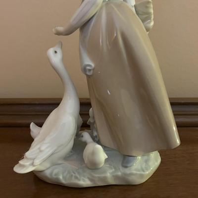 LOT 95: Lladro "Snails for the Ducks" Figure & "Little Duck" Figure