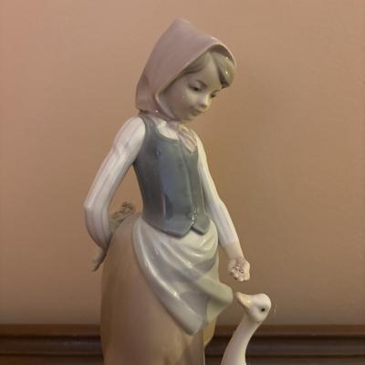 LOT 95: Lladro "Snails for the Ducks" Figure & "Little Duck" Figure