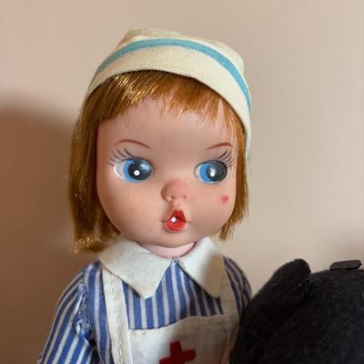 LOT 102: Wizard of Oz Action Figures, Our Gang Action Figures, Shirley Temple Dolls, Vintage Nurse Doll, Mickey Mouse Club Doll (missing...