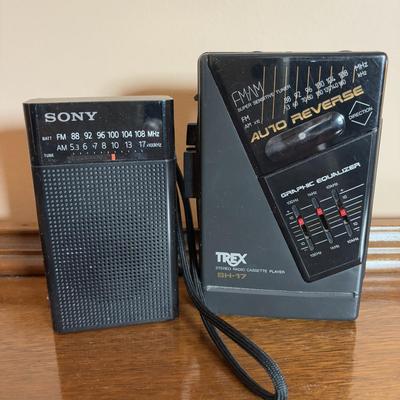 LOT 104: Transistor Radios, Sylvania Portable DVD Player, Olympus Pearlcorder, Am/Fm Cordless Portable Alarm Clock Radio