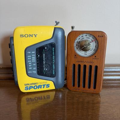 LOT 104: Transistor Radios, Sylvania Portable DVD Player, Olympus Pearlcorder, Am/Fm Cordless Portable Alarm Clock Radio