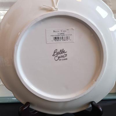 LOT 192: Bella Casa by Ganz Fruit Art Plates, Berkley Jenson Serving Platter, Coyne's Co. Picnic Basket Cheese Knife Set & More