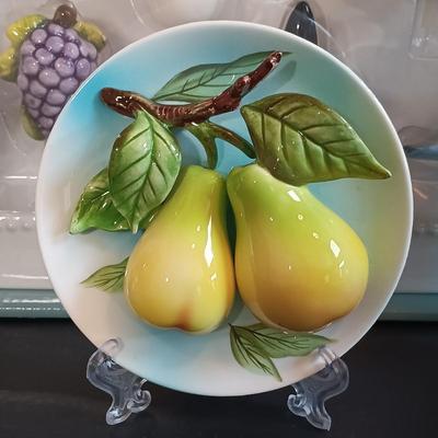 LOT 192: Bella Casa by Ganz Fruit Art Plates, Berkley Jenson Serving Platter, Coyne's Co. Picnic Basket Cheese Knife Set & More