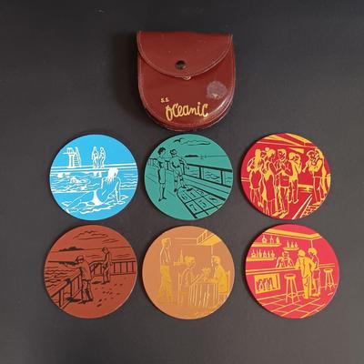 LOT 195: Vintage Cobalt Blue Sailboat Glass, S.S. Oceanic Coaster Set, Global Miniatures Artist Signed Prints & More