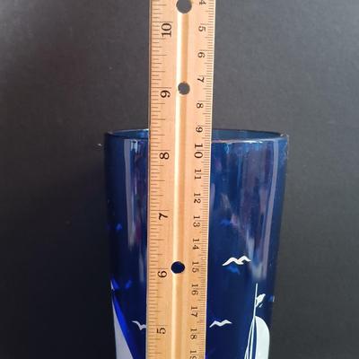 LOT 195: Vintage Cobalt Blue Sailboat Glass, S.S. Oceanic Coaster Set, Global Miniatures Artist Signed Prints & More