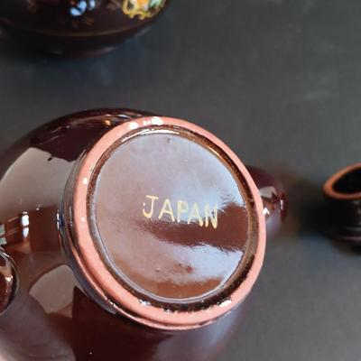 LOT 197: Denby 'Nevva Drip' Teapot with Set of (3) Redware Teapots