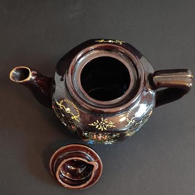 LOT 197: Denby 'Nevva Drip' Teapot with Set of (3) Redware Teapots