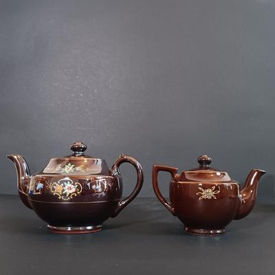 LOT 197: Denby 'Nevva Drip' Teapot with Set of (3) Redware Teapots