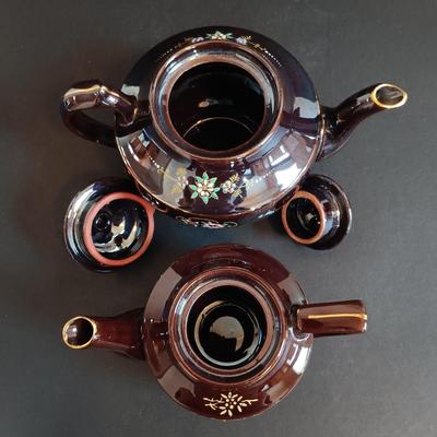 LOT 197: Denby 'Nevva Drip' Teapot with Set of (3) Redware Teapots
