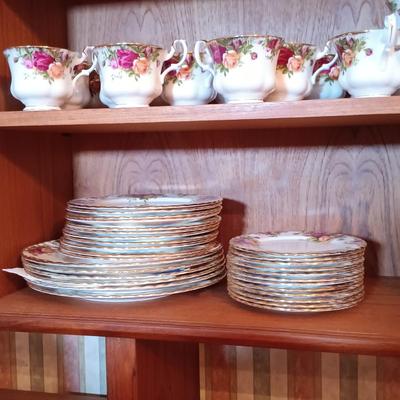 LOT 208: Large Set of Royal Albert Old Country Rose Cups, Saucers, Plates, Wine Glasses, Creamer and Sugar Bowl