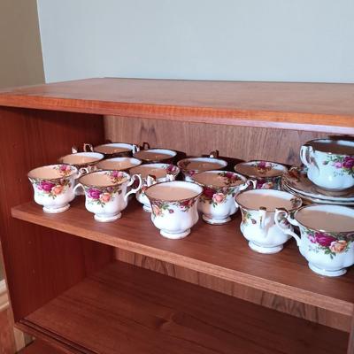 LOT 208: Large Set of Royal Albert Old Country Rose Cups, Saucers, Plates, Wine Glasses, Creamer and Sugar Bowl