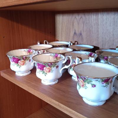 LOT 208: Large Set of Royal Albert Old Country Rose Cups, Saucers, Plates, Wine Glasses, Creamer and Sugar Bowl