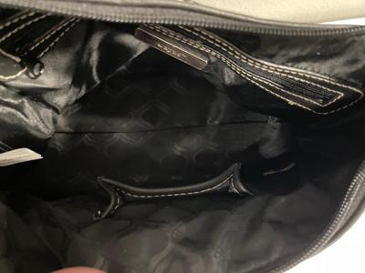 2 black purses with tags
