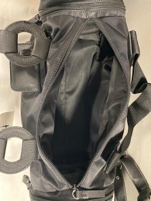 2 black purses with tags