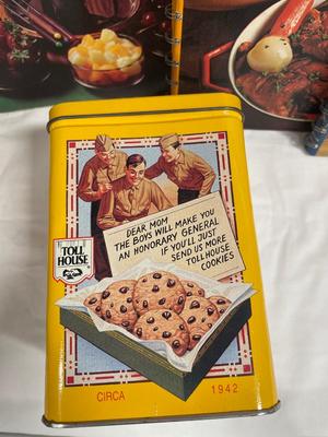 Basket with vintage cookbooks and tin